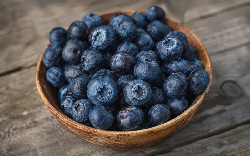 Close-up of a bowl of fresh ripe blueberries
