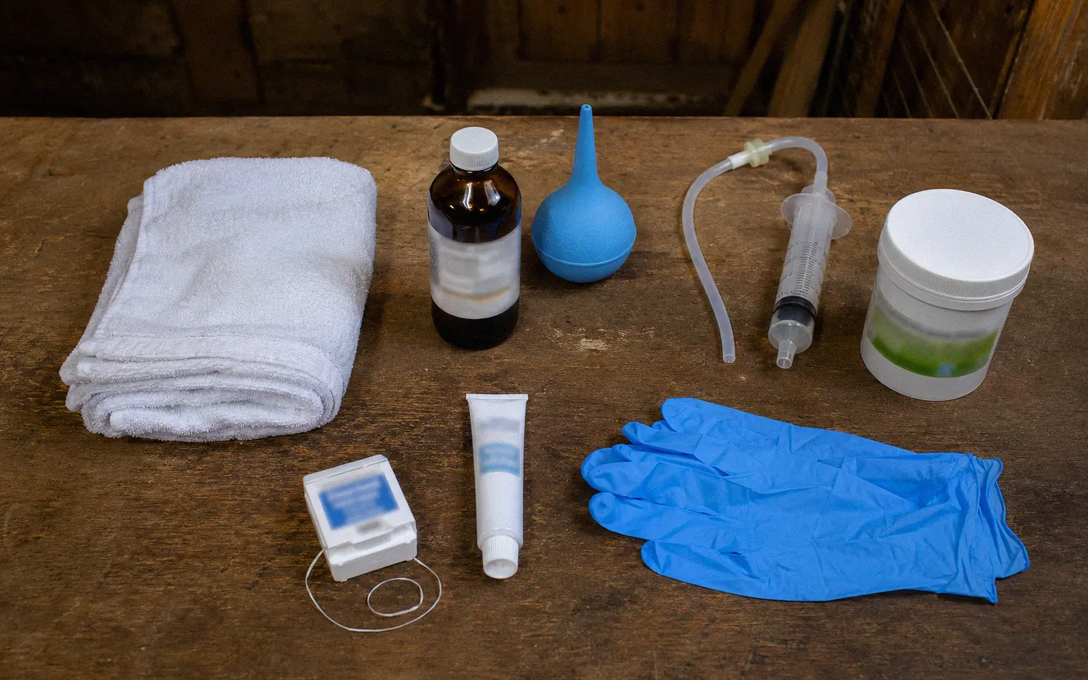 A veterinarian performing an ultrasound on a young Nigerian Dwarf doeling to check for early pregnancy